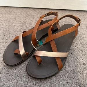 Olukai Upena flat dressy leather sandal in brown/gold